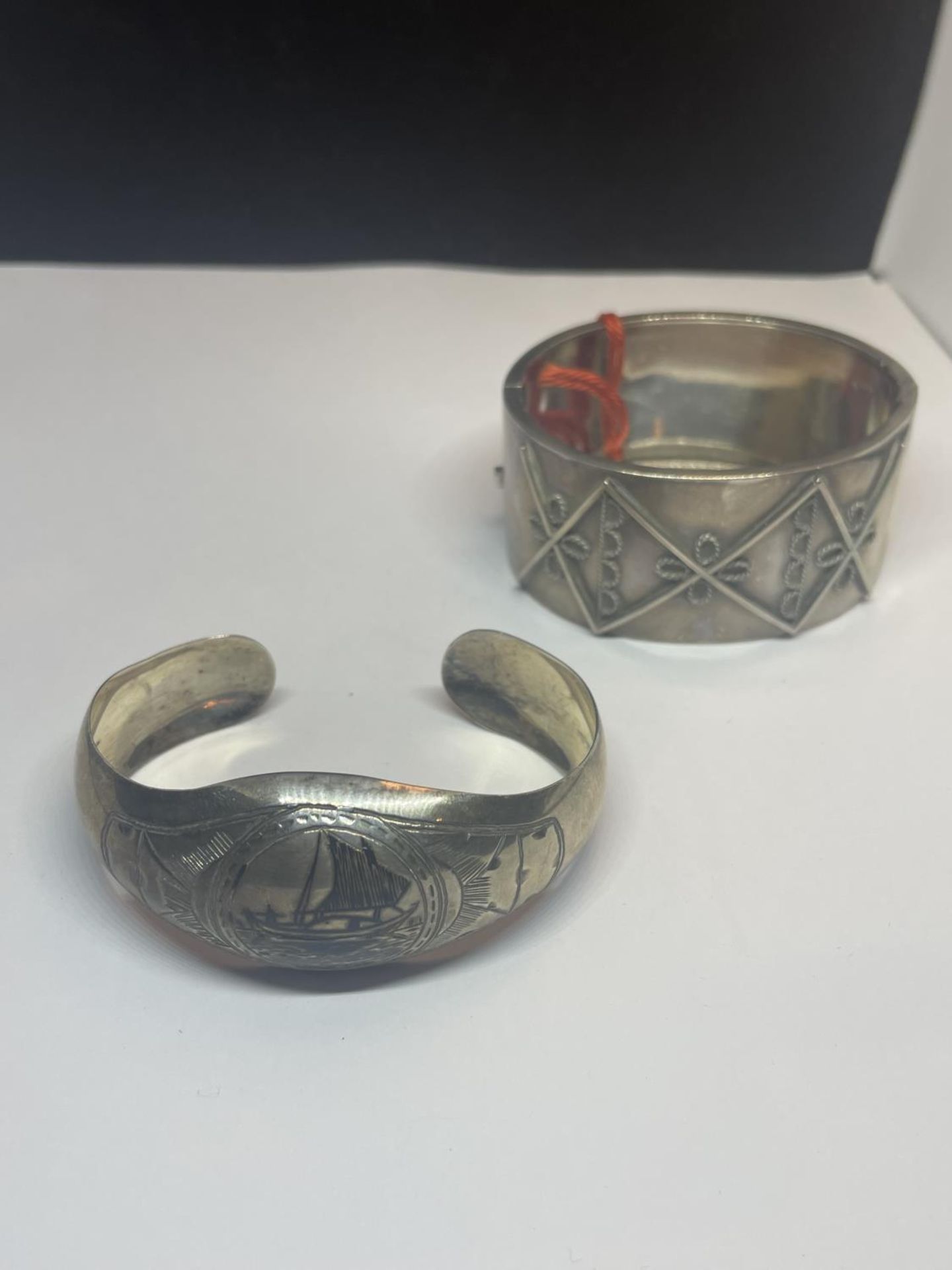 TWO BANGLES BOTH TESTED TO SILVER