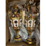 A PAIR OF ROYAL CROWN DERBY LIDDED URN STYLE VASES, BOTH WITH EXTENSIVE DAMAGE