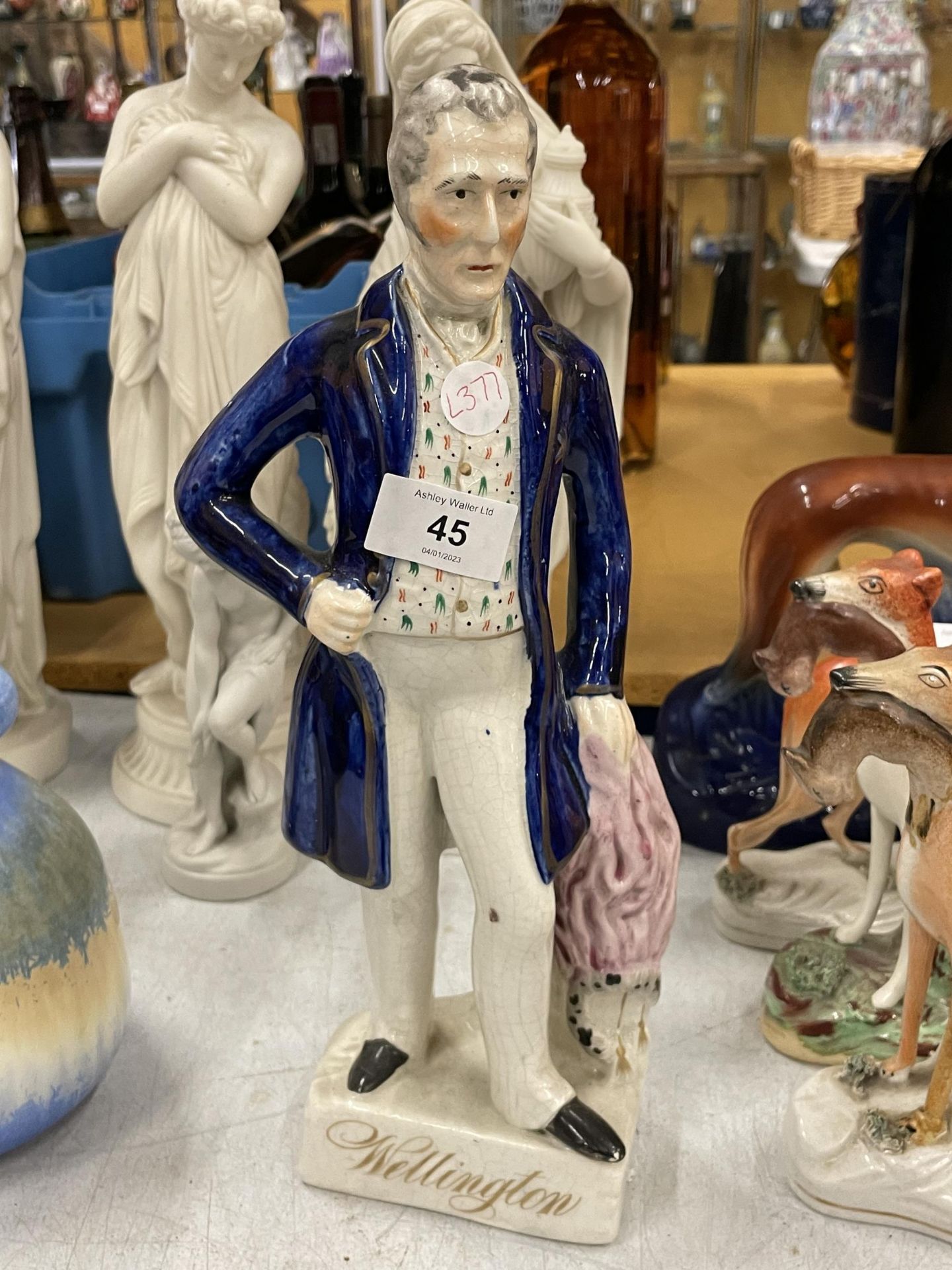 A MID 19TH CENTURY STAFFORDSHIRE POTTERY MODEL OF WELLINGTON