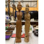 TWO HAND CARVED ORIENTAL STYLE FIGURES OF LADIES HEIGHT 64CM AND 67CM