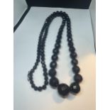 A WHITBY JET NECKLACE ADJUSTABLE LENGTH APPROXIMATELY 98CM