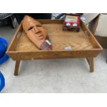 A WOODEN BREAKFAST TRAY, A TREEN WALL MASK AND A SET OF ORIENTAL HEALTH BALLS