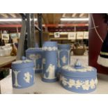 SIX PIECES OF WEDGWOOD JASPERWARE TO INCLUDE VASES AND LIDDED STORAGE JARS