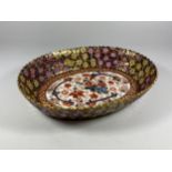 AN UNUSUAL IMARI PATTERN FLORAL PORCELAIN BOWL WITH MATCHING ALL OVER PATTERN TO BASE