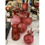 A LARGE QUANTITY OF CRANBERRY GLASSWARE TO INCLUDE MAINLY JUGS, SOME WITH STOPPERS AND PONTIL MARKS