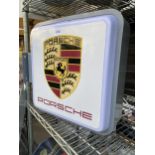 AN ILLUMINATED DOUBLE SIDED 'PORSCHE' SIGN WITH LEAD AND PLUG