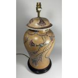 A LARGE ORIENTAL POTTERY TABLE LAMP WITH FLORAL DESIGN ON WOODEN BASE, HEIGHT APPROX 54CM