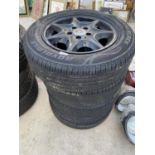A SET OF FOUR MERCEDES BENZ ALLOY WHEELS WITH 195/65R15 TYRES