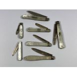 A SET OF SEVEN HALLMARKED SILVER AND MOTHER OF PEARL FRUIT KNIVES