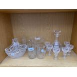 AN ASSORTMENT OF GLASS WARE TO INCLUDE A DECANTER, SHERRY GLASSES AND A POSIE BASKET ETC