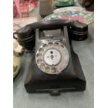 A BLACK GPO BAKELITE TELEPHONE WITH PULL OUT DRAWER MODEL 312