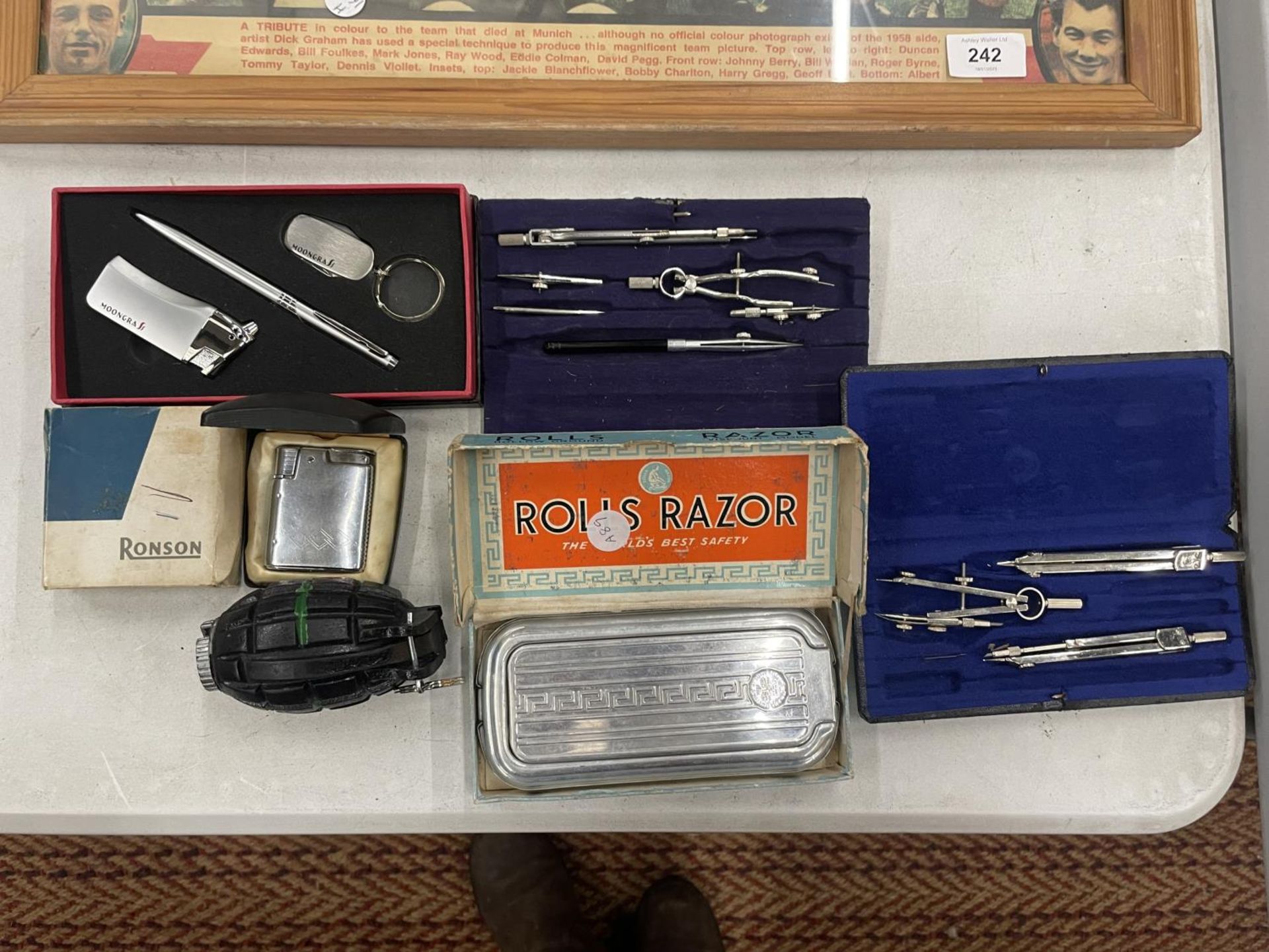 A QUANTITY OF COMPASSES TO INCLUDE BIRK MADE IN GERMANY, RONSON LIGHTER, VINTAGE ROLLS RAZOR, ETC.,