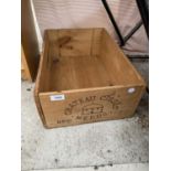 A WOODEN MONOGRAMED CHATEAU CISSAC WINE BOX