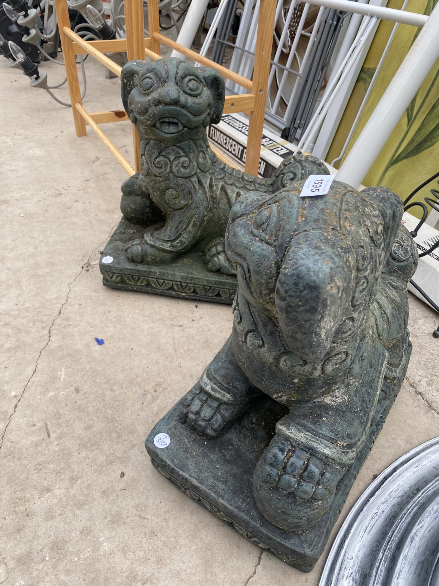 A PAIR OF RECONSTITUTED STONE ORIENTAL STYLE LIONS - Image 2 of 4