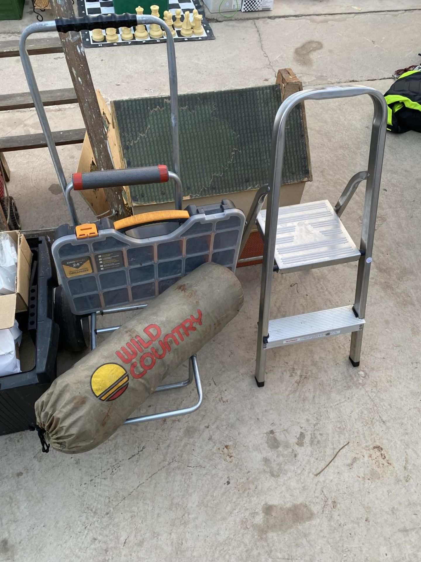 A SMALL ALUMINIUM STEP LADDER, A TROLLEY AND A TOOL BOX ETC