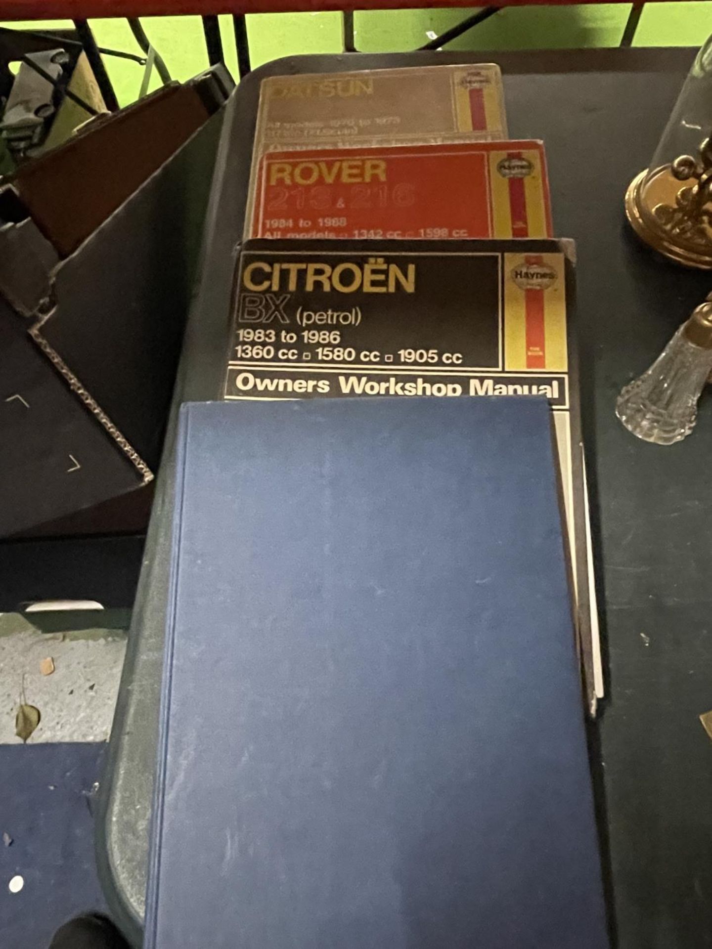 THREE HAYNES HARDBACK CAR MANUALS FOR CITROEN BX, ROVER 213 AND 216 AND DATSUN 1200 PLUS A '