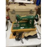 A RARE VINTAGE GREEN PAX SEWING MACHINE WITH HILLMAN MOTOR, IN ORIGINAL CASE, PEDAL AND BOOKLET