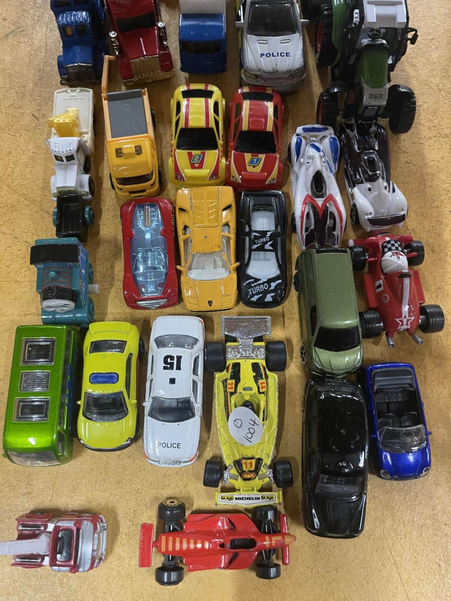 A LARGE QUANTITY OF TOY VEHICLES TO INCLUDE TRUCKS AND CARS, ETC - Image 2 of 4