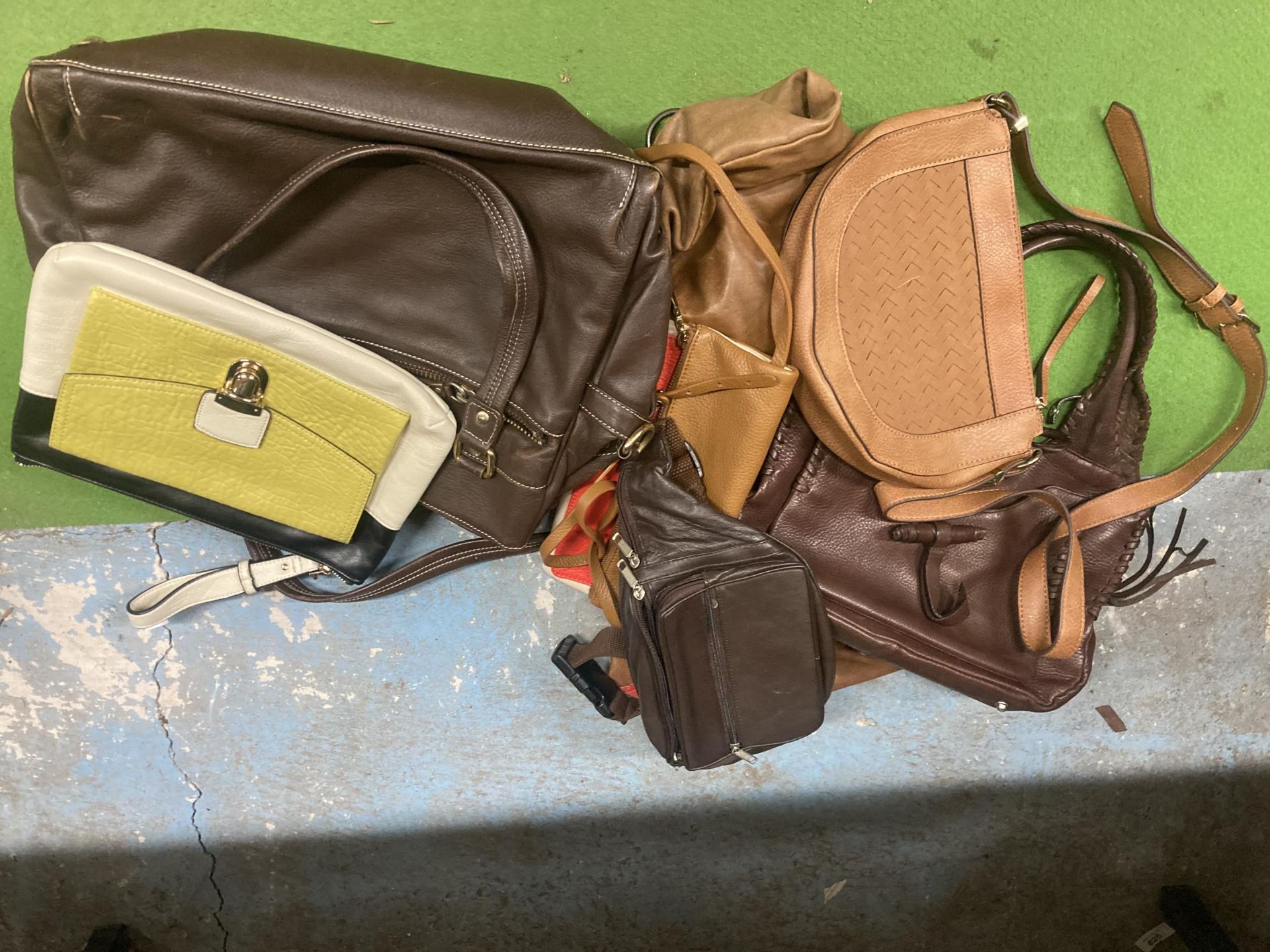 A QUANTITY OF LEATHER HAND BAGS