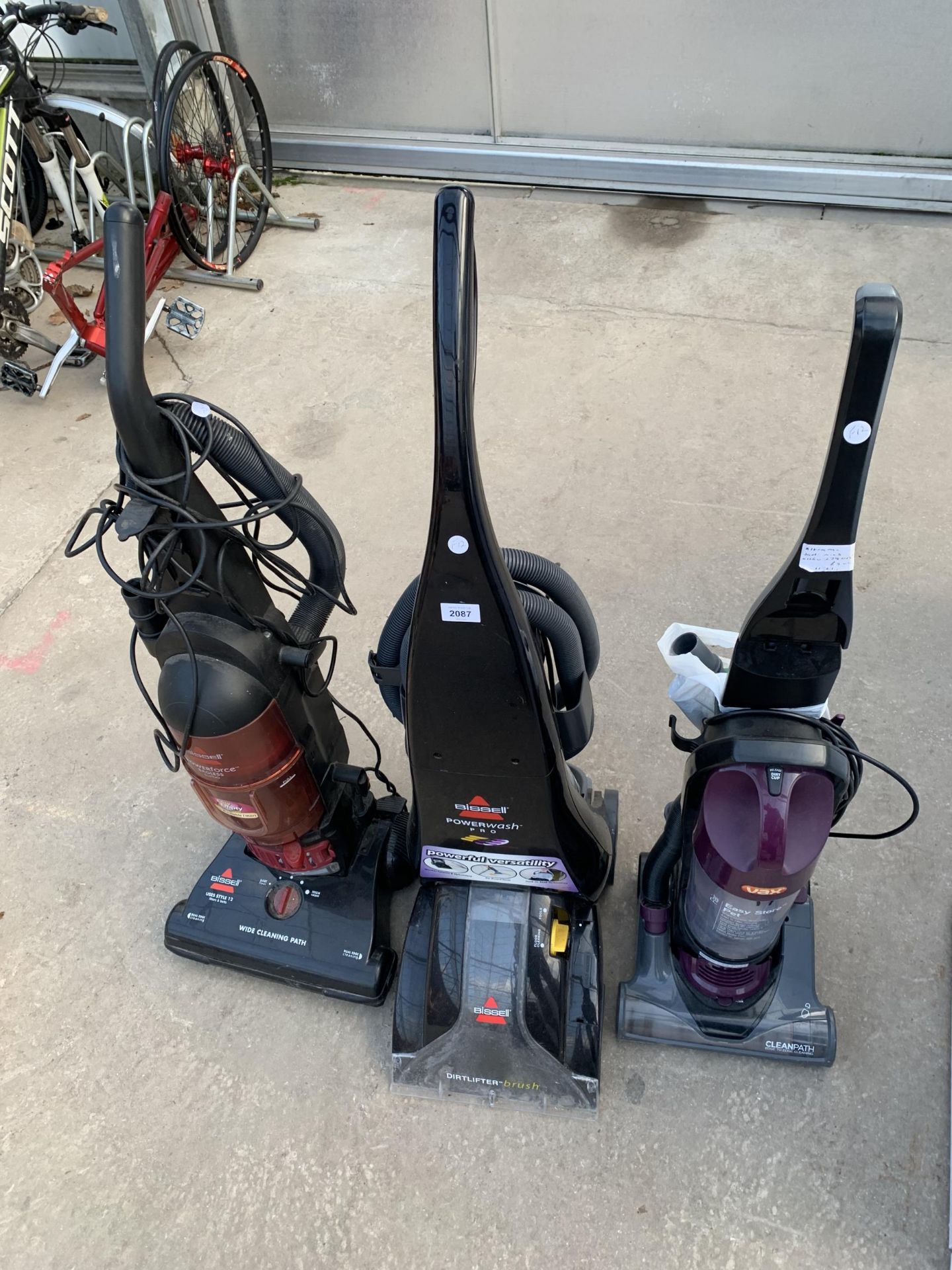 THREE VACUUM CLEANERS TO INCLUDE A BISSELL CARPET CLEANER, VAX AND BISSELL BAGLESS VACUUM
