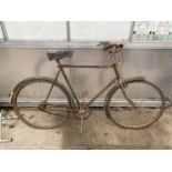 A VINTAGE GENTS PUSH BIKE WITH HURCLES SADDLE