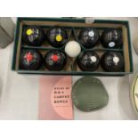 A BOXED SET OF CARPET BOWLS