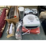 AN ASSORTMENT OF ITEMS TO INCLUDE HEATERS, A HAND MIXER AND WAFFLE MAKER ETC