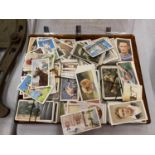 A LARGE COLLECTION OF CIGARETTE CARDS TO INCLUDE HOUSEHOLD HINTS, DOGS, SPORTING, ETC