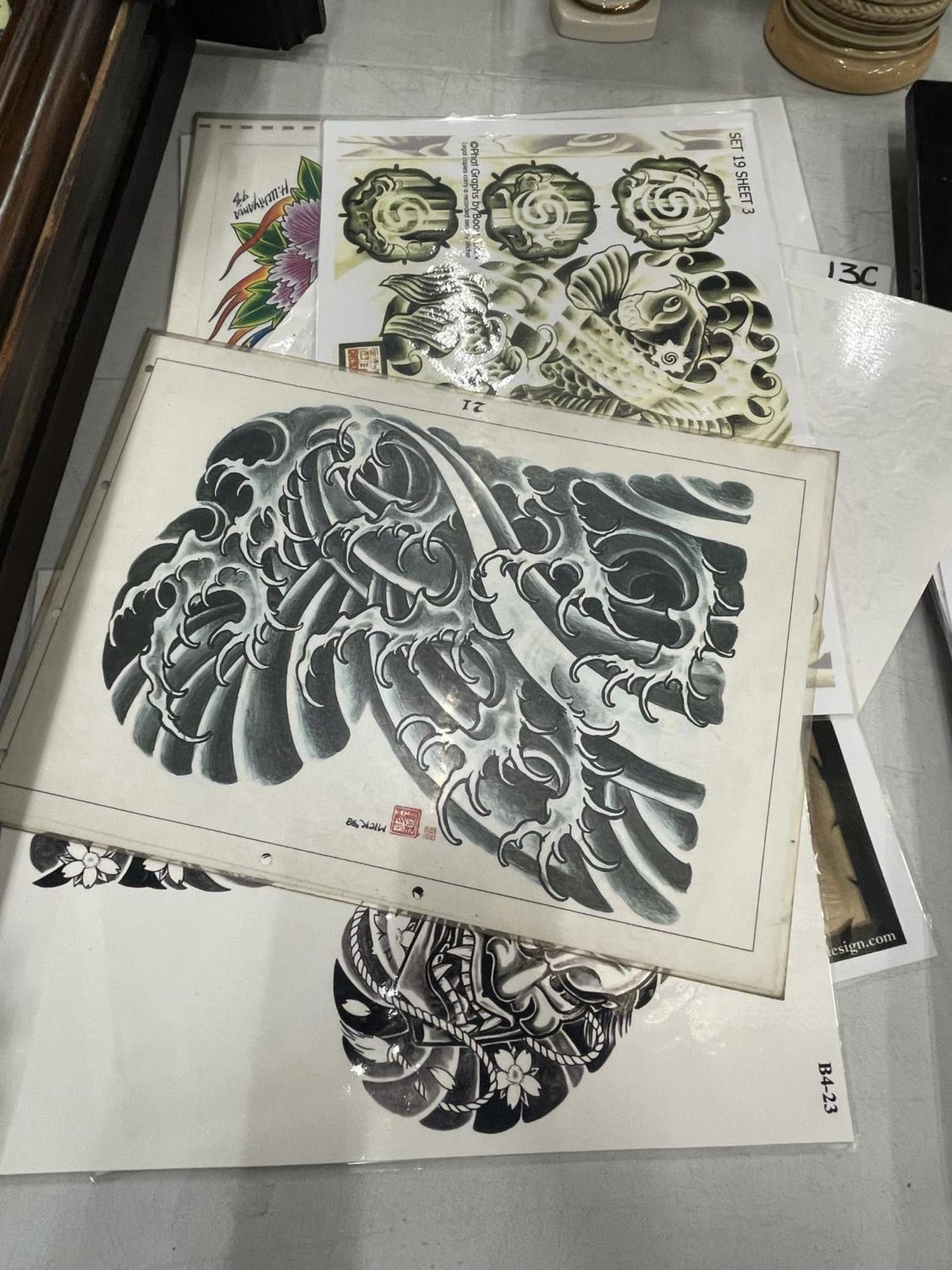 TEN LAMINATED LIMITED EDITION ORIENTAL TATTOO DESIGNS - Image 2 of 3