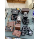 AN ASSORTMENT OF VINTAGE PHOTOGRAPHY EQUIPMENT TO INCLUDE BINOCULARS, CAMERAS AND CAMERA CASES ETC