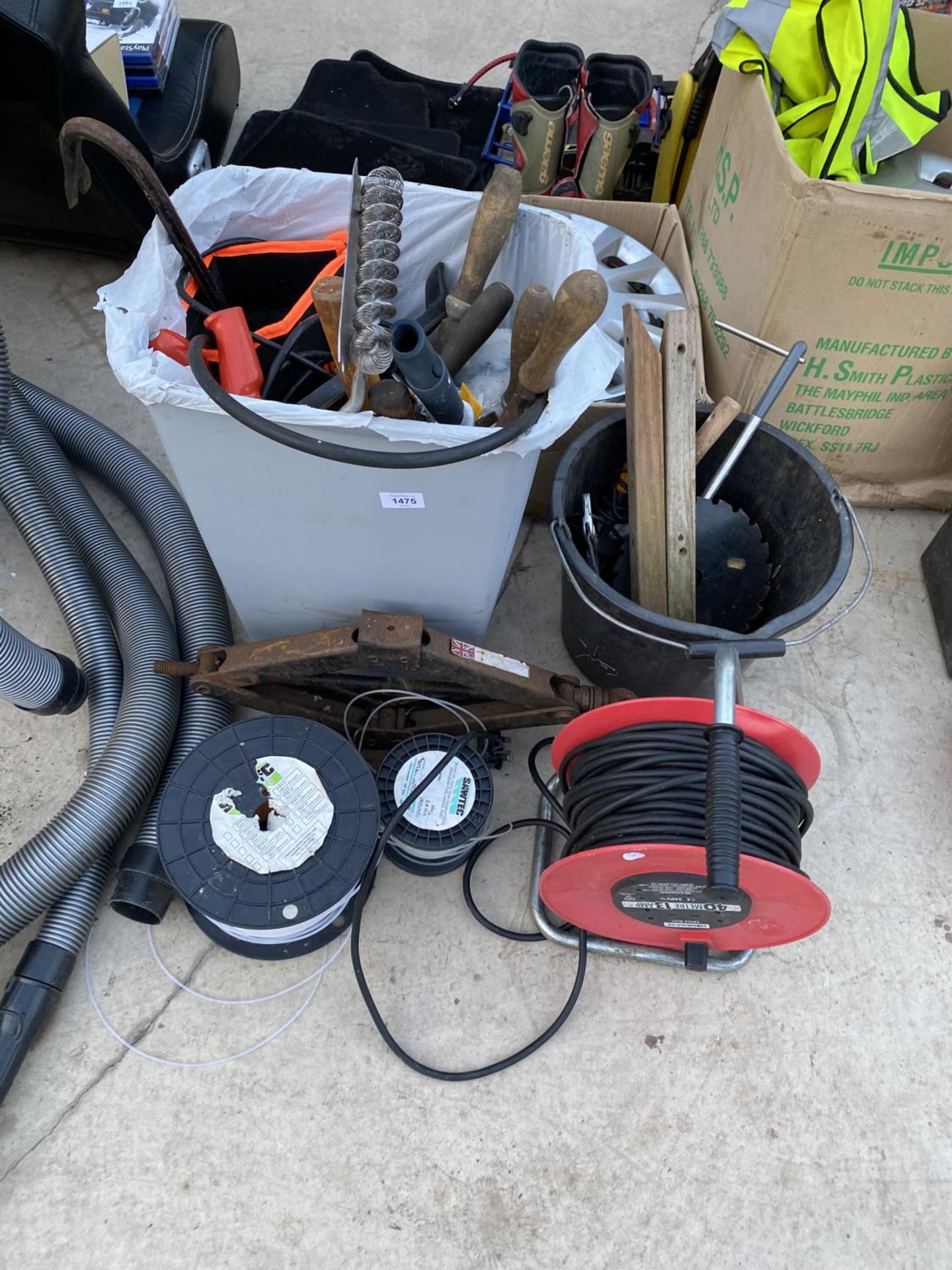 AN ASSORTMENT OF TOOLS TO INBCLUDE AN EXTENSION LEAD, A JACK AND FILES ETC