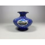 AN ORIENTAL ENAMEL CLOISONNE TYPE SQUAT VASE, HEIGHT 10CM