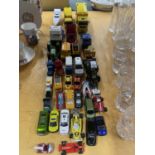 A LARGE QUANTITY OF TOY VEHICLES TO INCLUDE TRUCKS AND CARS, ETC