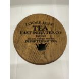 AN OAK PLAQUE 'EAST INDIA TEA CO' DIAMETER 26CM