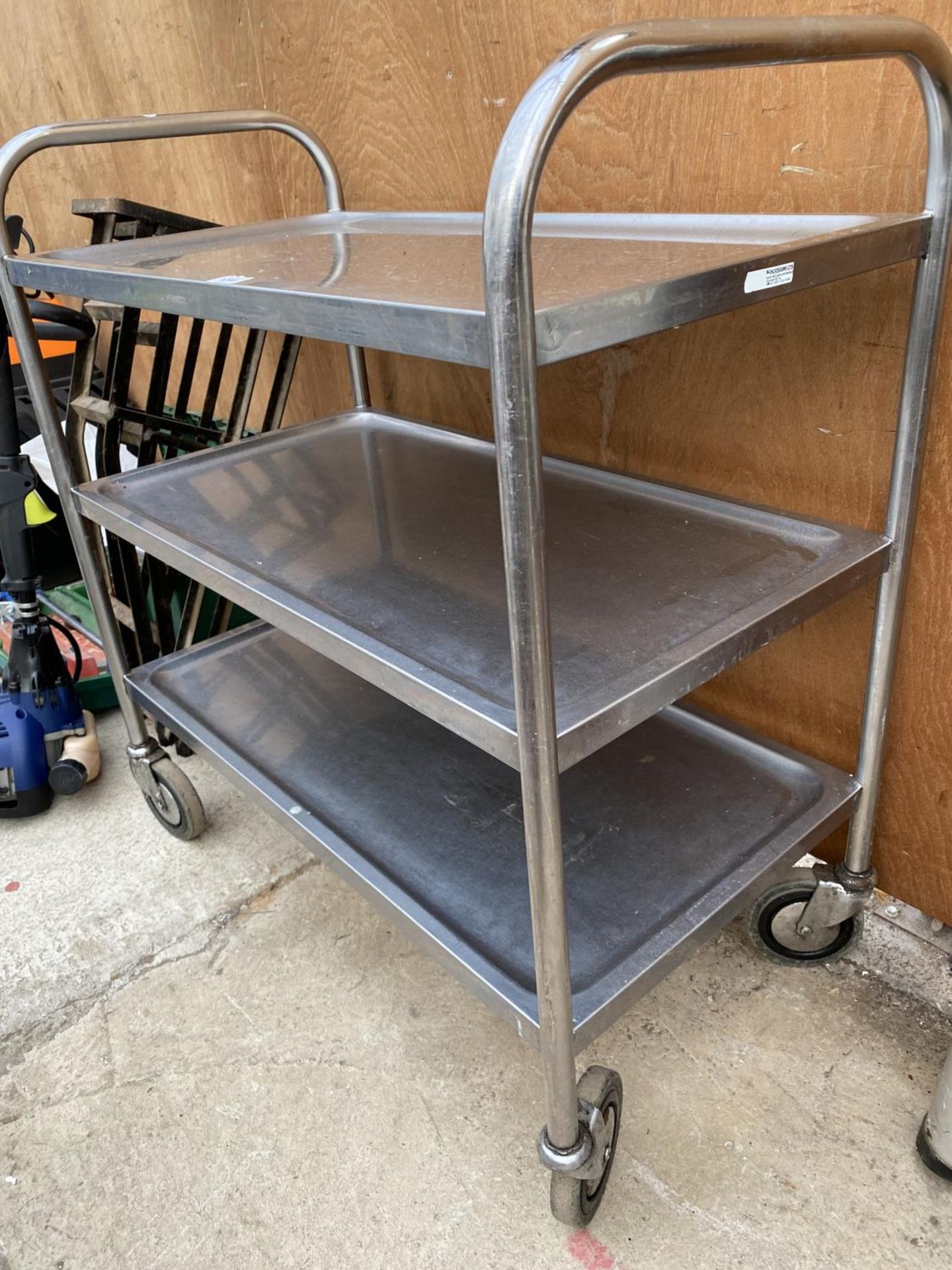 A STAINLESS STEEL FOUR WHEELED THREE TIER TROLLEY - Image 2 of 3