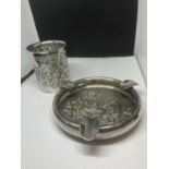 TWO DANISH WHITE METAL ITEMS TO INCLUDE A BEAKER & ASHTRAY, BOTH WITH FIGURAL DESIGN, STAMPED