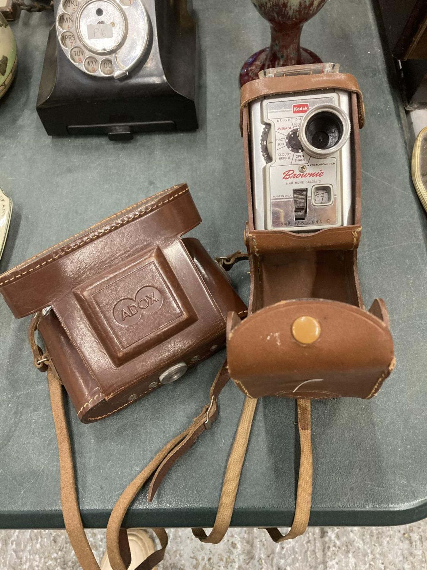 TWOO VINTAGE CAMERAS IN CASES TO INCLUDE A BROWNIE AND AN ADOX