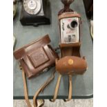 TWOO VINTAGE CAMERAS IN CASES TO INCLUDE A BROWNIE AND AN ADOX