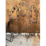 A VINTAGE WROUGHT IRON THREE SECTION FOLDING SCREEN WITH PLANT HOLDERS
