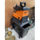 AN ELECTRIC TACKLIFE GARDEN SHREDDER