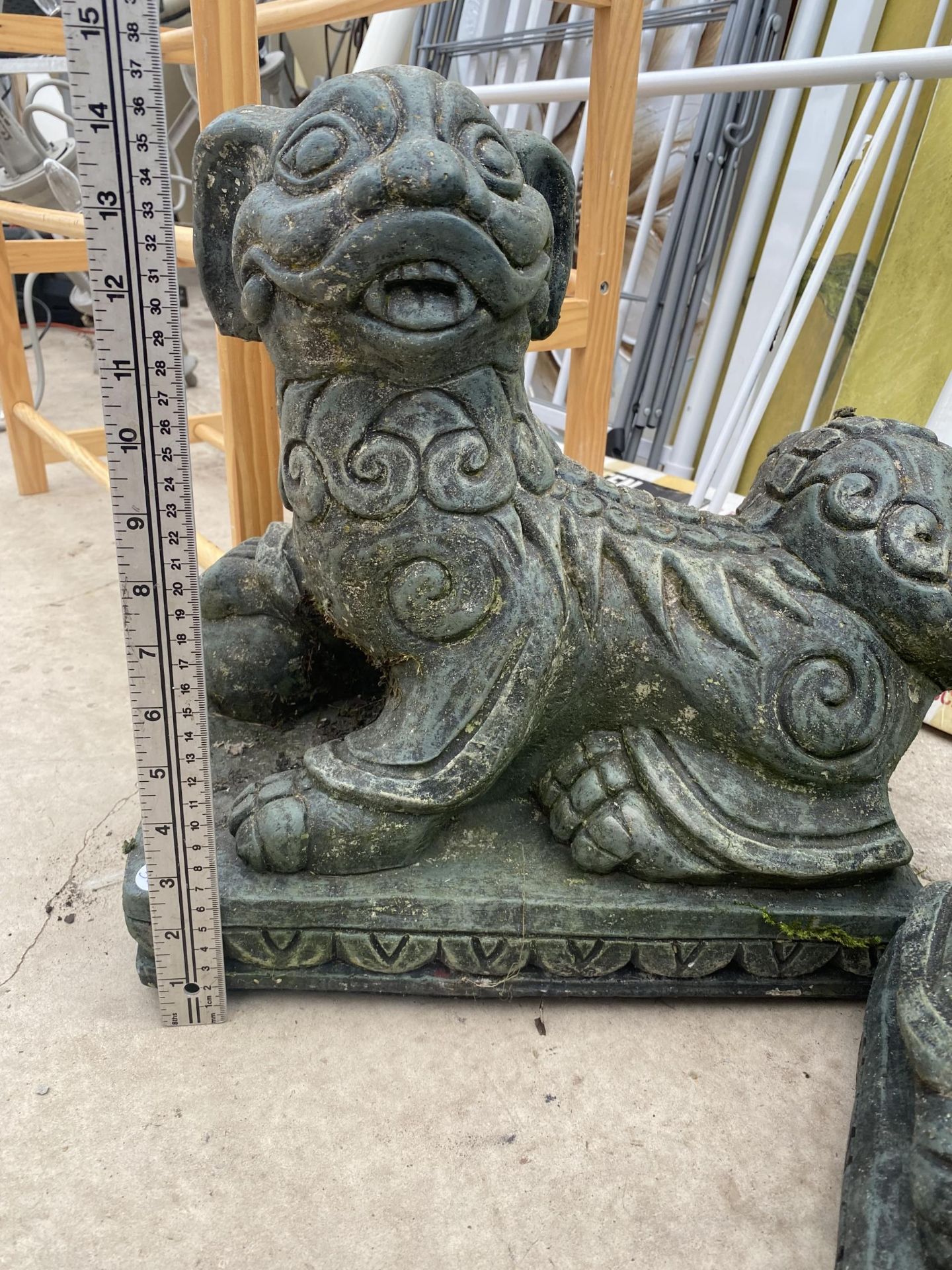 A PAIR OF RECONSTITUTED STONE ORIENTAL STYLE LIONS - Image 3 of 4