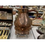 A LARGE GALLON COPPER JUG WITH MAKERS MARK HEIGHT 25CM PLUS A BURNER