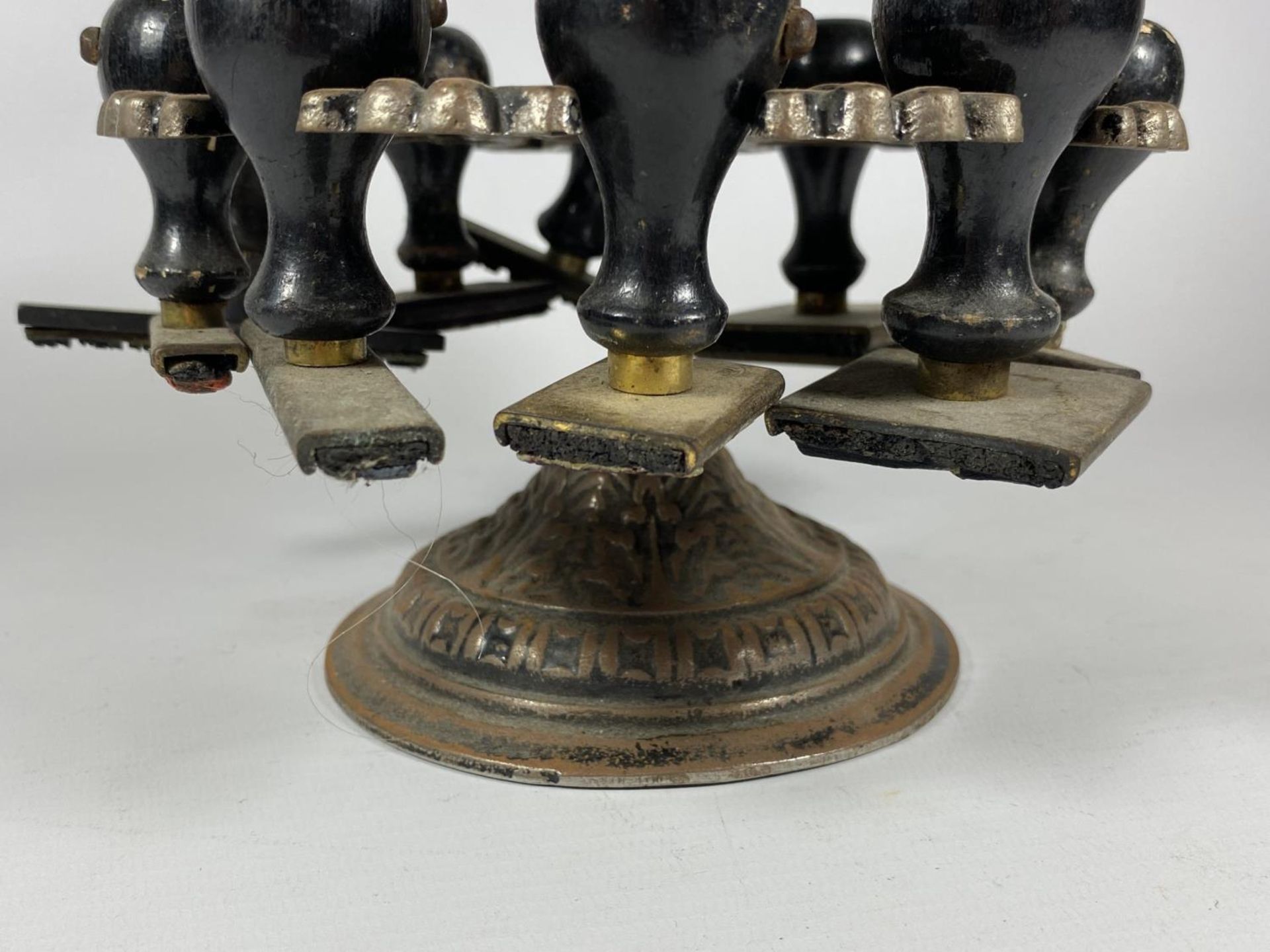AN UNUSUAL 19TH CENTURY BRASS TWO TIER REVOLVING STAMP HOLDER WITH ORIGINAL EBONY HANDLED STAMPS, - Image 2 of 4