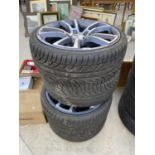 A SET OF FOUR VAUXHALL ASTRA ALLOY WHEELS WITH 225/35ZR19 LOW PROFILE TYRES