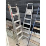 A THREE WAY ALUMINIUM LADDER AND A FIVE RUNG ALUMINIUM STEP LADDER