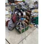 A GOLF BAG CONTAINING AN ASSORTMENT OF GOLF CLUBS TO INCLUDE DUNLOP AND WILSON ETC