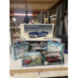 A COLLECTION OF DIE CAST METAL CARS AND SCOOTERS TO INCLUDE LAMBRETTA, MGB ROADSTER AND CARAVAN,