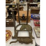 A VINTAGE CAST IRON BOOT SCRAPER AND WELLINGTON HOLDER WITH HORSESHEAD DECORATION