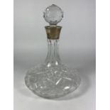 A HALLMARKED SILVER COLLARED AND CUT GLASS SHIPS DECANTER, BIRMINGHAM 1979, MAKER S.J ROSE & SON,