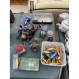 AN ASSORTMENT OF FISHING TACKLE TO INCLUDE REELS, LURES AND FLIES ETC